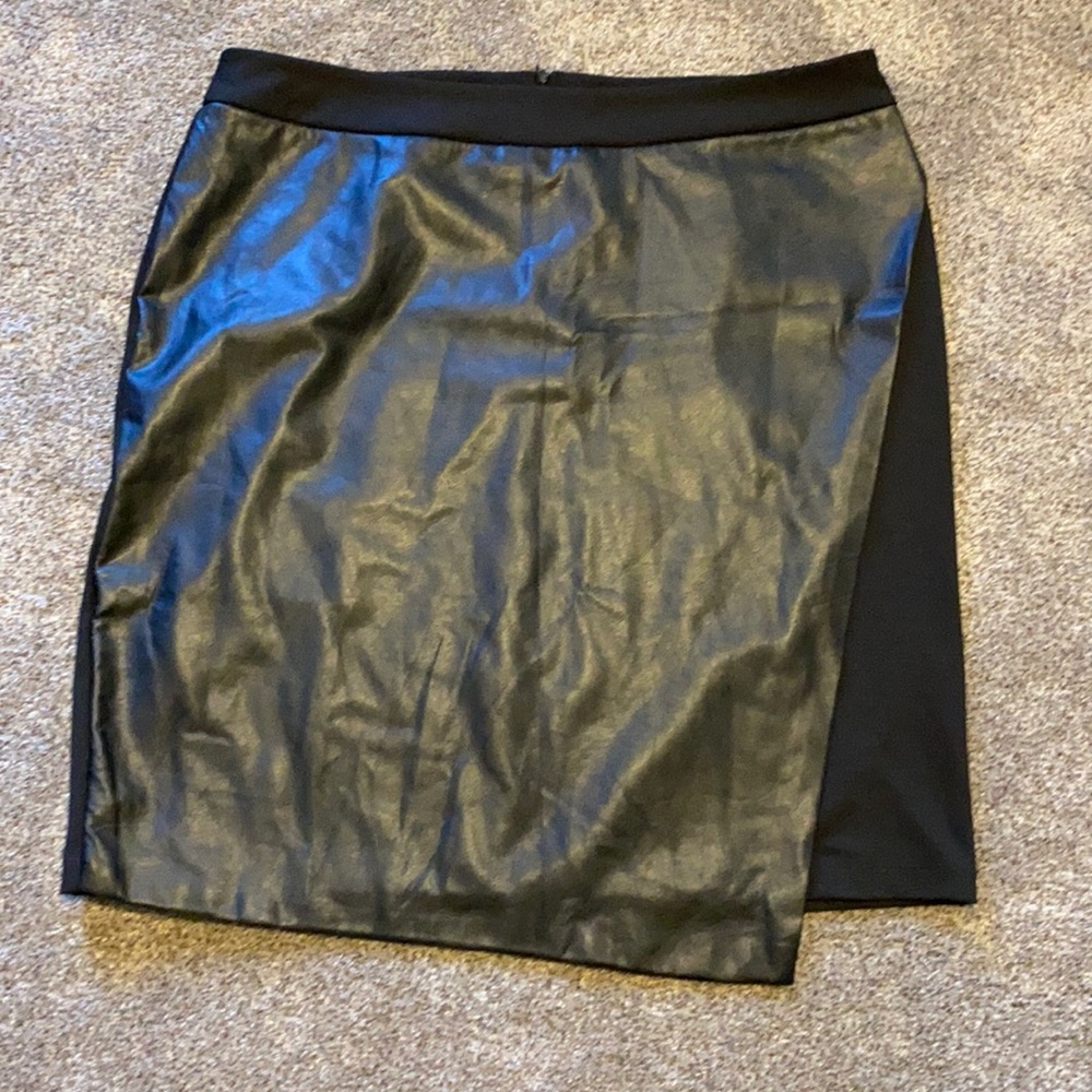 Black skirt with leather look front.